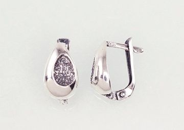 Silver earrings with 'english' lock 
