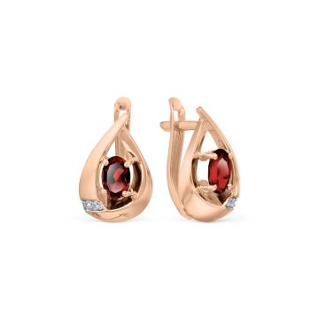 Earrings in red gold of 585 assay value with garnet, zirconia 