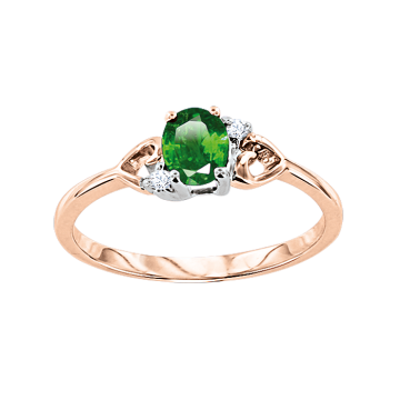 Lady´s ring in red gold of 585 assay value with diamonds and emeralds 