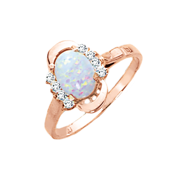 Lady´s ring in red gold of 585 assay value with zirconia, opal 17,5 mm