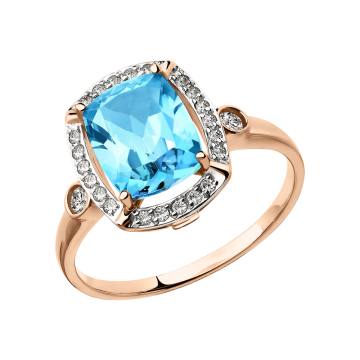 Lady´s ring in red gold of 585 assay value with blue topaz, zirconia 
