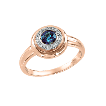 Lady´s ring in red gold of 585 assay value with diamonds and London topaz 