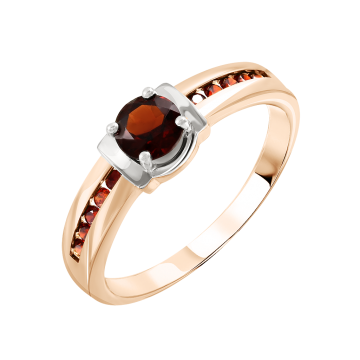 Lady´s ring in red gold of 585 assay value with garnet, zirconia 