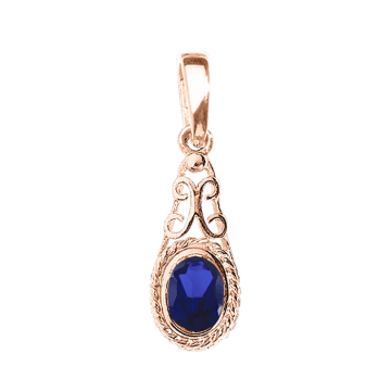 Pendant in red gold of 585 assay value with sapphire syn. 
