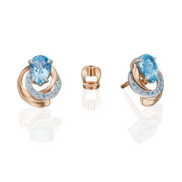 Earrings in red gold of 585 assay value with blue topaz 